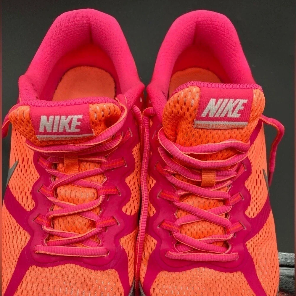 NIKE Dual‎ Fusion 3 running shoe, size 6.5 youth or 8.5 women's.